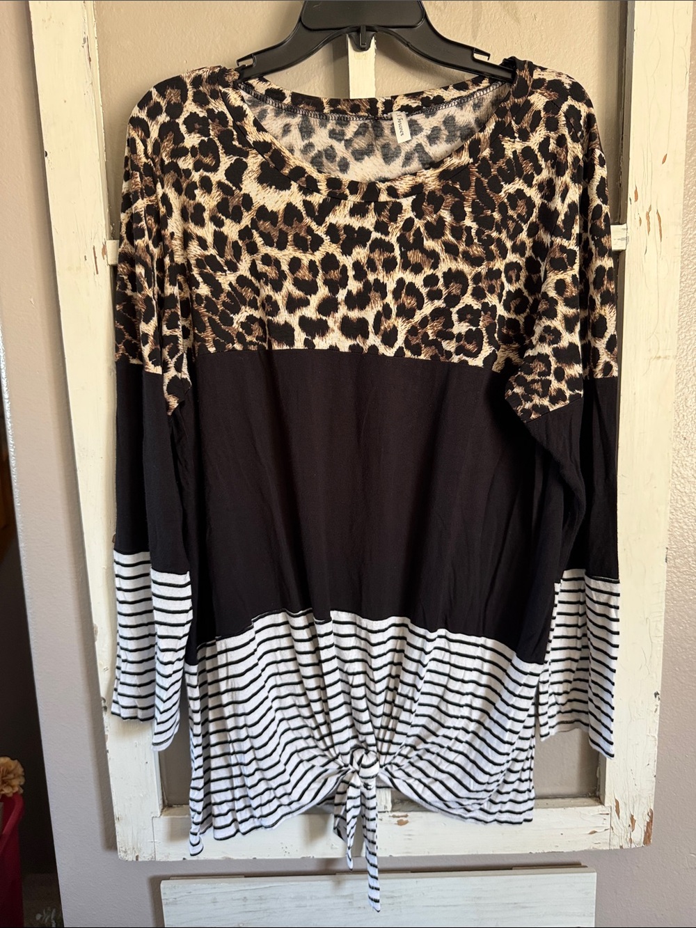 Now n Forever leopard print, black, and striped Tie-Front Long sleeved shirt.